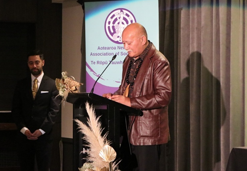 Okesene speaking at the ANZASW Social Work awards